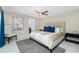 Elegant bedroom boasts a luxurious bed, stylish furnishings, and relaxing ambiance at 14195 Brisk Ave, Port Charlotte, FL 33953