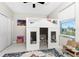 ' room featuring a custom-built house bed with white trim, offering a unique play and sleep space at 16271 Branco Dr, Punta Gorda, FL 33955