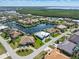 Scenic aerial view of waterfront homes with private docks nestled along a winding canal in a residential area at 1631 Casey Key Dr, Punta Gorda, FL 33950