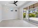 Bright bedroom with recessed lighting and sliding glass doors opening to the outside at 1631 Casey Key Dr, Punta Gorda, FL 33950
