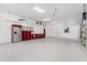 Spacious garage features durable floors, plenty of storage, and access to the rest of the home at 1631 Casey Key Dr, Punta Gorda, FL 33950