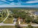 Wide aerial shot of home in relation to nearby lakes and the horizon at 16571 Cape Horn Blvd, Punta Gorda, FL 33955