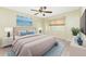 Cozy bedroom with a comfortable bed, soft lighting, and soothing decor at 16571 Cape Horn Blvd, Punta Gorda, FL 33955