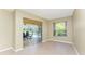 Bright sitting area offering tile flooring and sliding door access to the lanai at 16571 Cape Horn Blvd, Punta Gorda, FL 33955