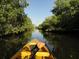 Waterfront view perfect for kayaking, surrounded by lush greenery and mangroves at 16571 Cape Horn Blvd, Punta Gorda, FL 33955