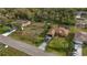 Aerial view of property showing the house, spacious yard, nearby roads, and surroundings at 17327 Wintergarden Ave, Port Charlotte, FL 33948