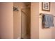 Tile shower stall featuring a glass door and brushed nickel fixtures at 17327 Wintergarden Ave, Port Charlotte, FL 33948