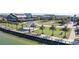 Stunning community area with a covered pavilion, lush landscaping, and a waterfront view for relaxation at 17954 Saddle Rd, Punta Gorda, FL 33982