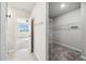 Spacious walk-in closet featuring carpeted floors and well-organized wire shelving at 17954 Saddle Rd, Punta Gorda, FL 33982