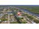 Beautiful aerial shot highlights waterfront homes along a canal with easy access to the ocean at 18662 Arapahoe Cir, Port Charlotte, FL 33948