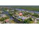 Aerial view showing the home nestled within a waterfront community with canal access at 18662 Arapahoe Cir, Port Charlotte, FL 33948