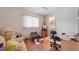 Bedroom with a ceiling fan and an open suitcase on the floor at 18662 Arapahoe Cir, Port Charlotte, FL 33948