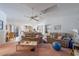 Open-concept living room flows into the kitchen and dining area, perfect for entertaining at 18662 Arapahoe Cir, Port Charlotte, FL 33948