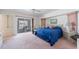 Main bedroom with lanai access, features serene decor, lots of space, and cozy seating at 18662 Arapahoe Cir, Port Charlotte, FL 33948