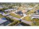 Overhead view of a beautiful neighborhood, showcasing the property's attractive landscaping and convenient street access at 20339 Gentry Ave, Port Charlotte, FL 33952
