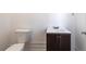 Bathroom with a toilet, vanity, and sink at 20339 Gentry Ave, Port Charlotte, FL 33952