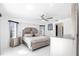 Bright bedroom with a comfortable bed, stylish furniture, and plenty of natural light at 20339 Gentry Ave, Port Charlotte, FL 33952
