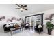 Well-lit living room with stylish furniture, modern decor, and bright tile flooring at 20339 Gentry Ave, Port Charlotte, FL 33952