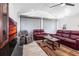 Living room featuring stylish decor, comfortable seating, and a TV for entertainment purposes at 20339 Gentry Ave, Port Charlotte, FL 33952