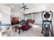 Living room showcasing entertainment options and exercise equipment at 20339 Gentry Ave, Port Charlotte, FL 33952