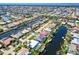 A beautiful aerial shot showcasing the homes in this canal community with gorgeous waterways at 2180 Via Esplanade, Punta Gorda, FL 33950
