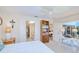 A bright bedroom showing the closet and vanity at 2180 Via Esplanade, Punta Gorda, FL 33950