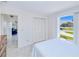 Bedroom with natural light and bi-fold closet at 2180 Via Esplanade, Punta Gorda, FL 33950