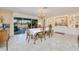 Elegant dining room with a chandelier and sliding doors to the outdoors at 2180 Via Esplanade, Punta Gorda, FL 33950