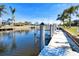 Private boat dock offering easy water access and serene canal views at 2180 Via Esplanade, Punta Gorda, FL 33950