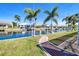 Scenic waterfront with a well-maintained brick path, and a private boat dock at 2180 Via Esplanade, Punta Gorda, FL 33950