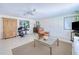 Spacious living room with tile flooring, furniture, and natural light at 2180 Via Esplanade, Punta Gorda, FL 33950
