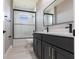 Modern bathroom featuring a glass shower, stylish vanity, and sleek fixtures at 24473 San Rafael Rd, Punta Gorda, FL 33955