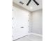 Bright bedroom closet featuring double doors and modern hardware at 24473 San Rafael Rd, Punta Gorda, FL 33955