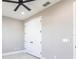 Bedroom closet with white double doors and matte black hardware at 24473 San Rafael Rd, Punta Gorda, FL 33955