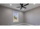 Well-lit bedroom with large window offering an outdoor view at 24473 San Rafael Rd, Punta Gorda, FL 33955