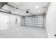 Spacious garage with speckled epoxy flooring and ample storage at 24473 San Rafael Rd, Punta Gorda, FL 33955