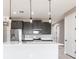 Well-equipped kitchen featuring stainless steel appliances, and an island with a breakfast bar at 24473 San Rafael Rd, Punta Gorda, FL 33955