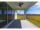 Spacious lanai with a ceiling fan, ideal for enjoying Florida's outdoor living at 24473 San Rafael Rd, Punta Gorda, FL 33955