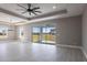 Open living room with recessed lighting, large sliding glass doors, and neutral paint at 24473 San Rafael Rd, Punta Gorda, FL 33955