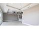 Bright open floor plan with hardwood floors and modern chandelier at 24473 San Rafael Rd, Punta Gorda, FL 33955