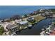 Beautiful aerial view of the waterfront property, highlighting the dock and water access at 250 George Rd, Port Charlotte, FL 33952