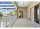 Balcony featuring tile flooring, a ceiling fan, and a stunning view at 250 George Rd, Port Charlotte, FL 33952