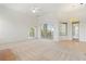 Spacious living room with carpet and a bay window at 250 George Rd, Port Charlotte, FL 33952