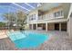 Outdoor pool area with pool and screened-in patio at 250 George Rd, Port Charlotte, FL 33952