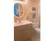 Neat bathroom featuring a vanity and neutral decor at 25188 Marion Ave # F303, Punta Gorda, FL 33950