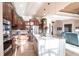 Stylish kitchen boasts a large island, stainless steel appliances, and seamless flow to the living area at 257 Lido Dr, Punta Gorda, FL 33950