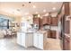 Bright kitchen with a large island, custom cabinets, and stainless steel appliances at 257 Lido Dr, Punta Gorda, FL 33950