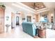Open-concept living space with tile floors, light walls, and views of the front door and other rooms at 257 Lido Dr, Punta Gorda, FL 33950