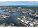 An aerial view of a waterfront community with canals and boats, showing the home's location at 258 Venezia Ct, Punta Gorda, FL 33950