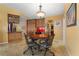Dining area with built-in desk area and views of the kitchen and other areas of the home at 258 Venezia Ct, Punta Gorda, FL 33950